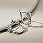 Aretes Huggies Cruz Turquesa